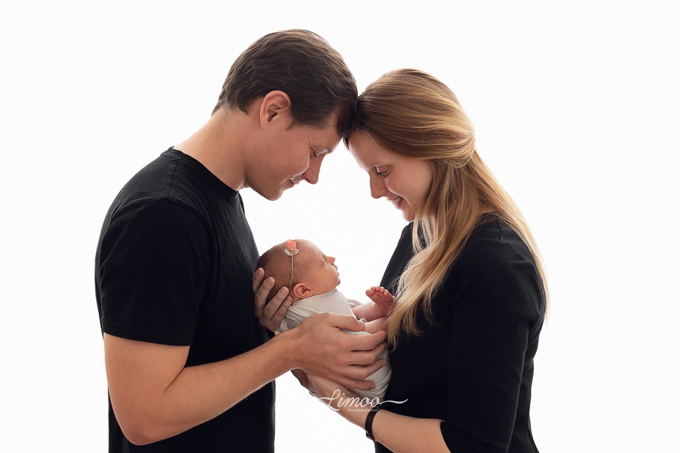 family photography newborn back lighting black cloths