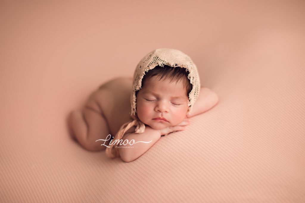 Fine art newborn baby pictures courtesy of Limoo Photography